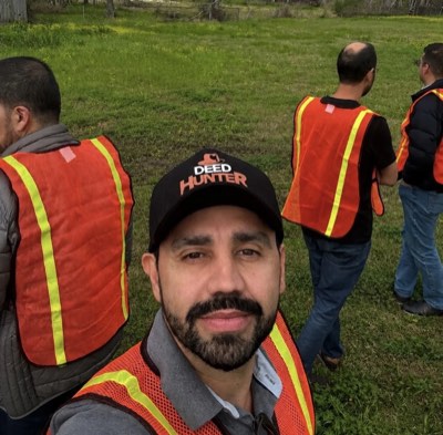 Rener inspecting property